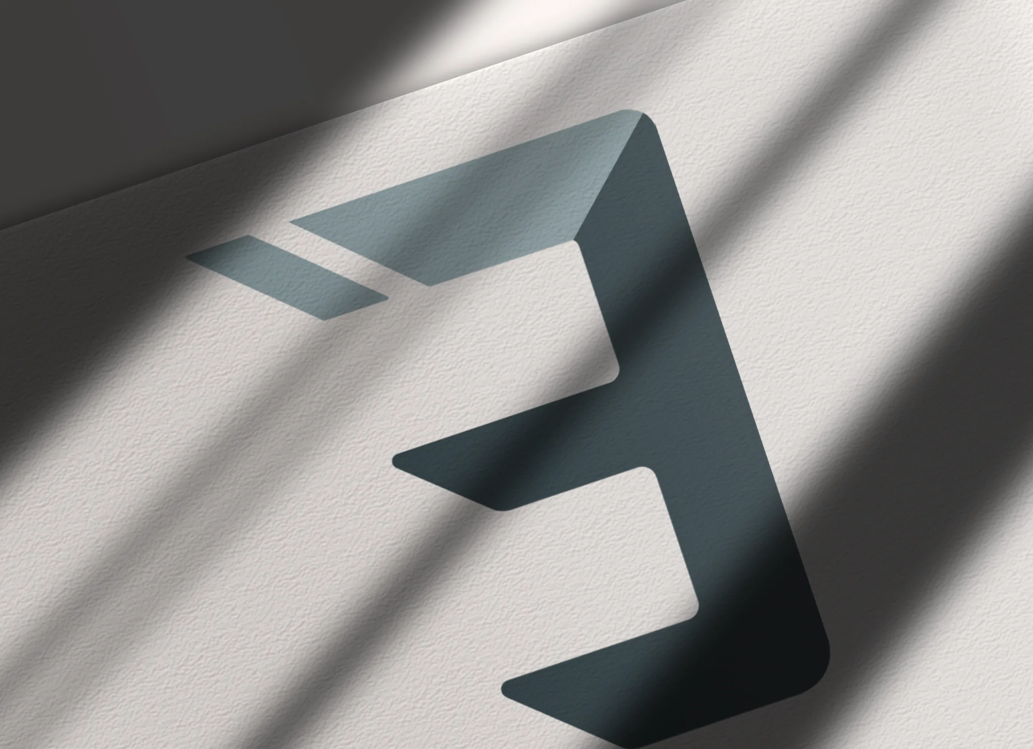 Close-up of the ELEMENT Preserve Lab geometric E brand symbol